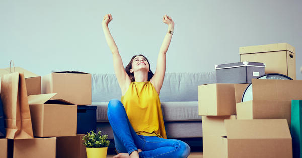 Young Woman Moving Home