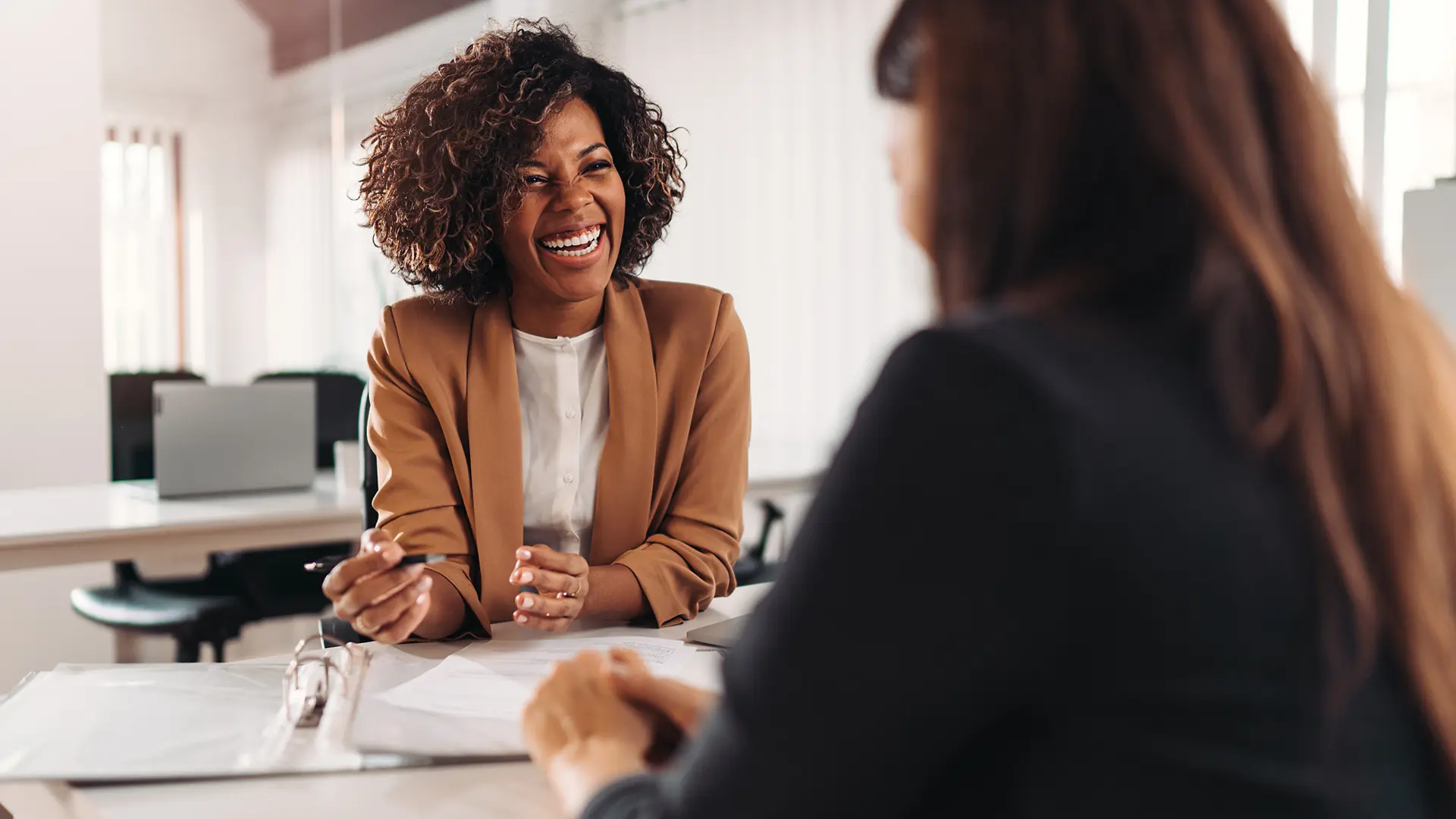 Two Women Talking Customer And Housing Officer