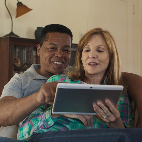 Older Couple On Tablet