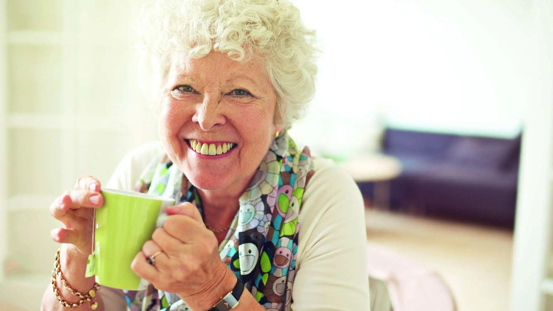 Older Lady Drinking Tea At Home