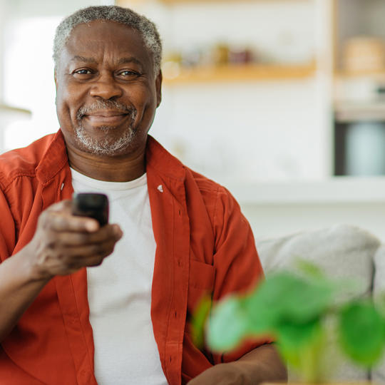 Older Man Happy At Home