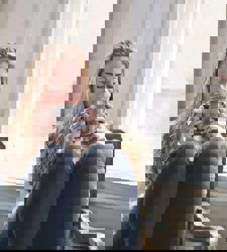 Woman In Her Home Relaxing